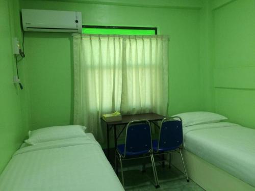 Imagen general del Hotel Nay Chi Lin. Foto 5