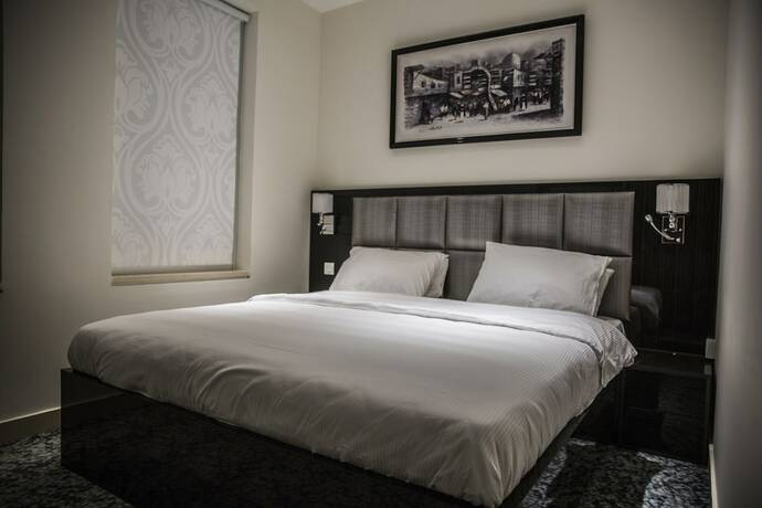 Imagen de la habitación del Hotel Naylover Suites. Foto 11