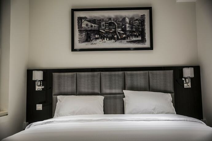 Imagen de la habitación del Hotel Naylover Suites. Foto 13