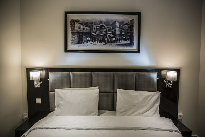 Imagen de la habitación del Hotel Naylover Suites. Foto 14