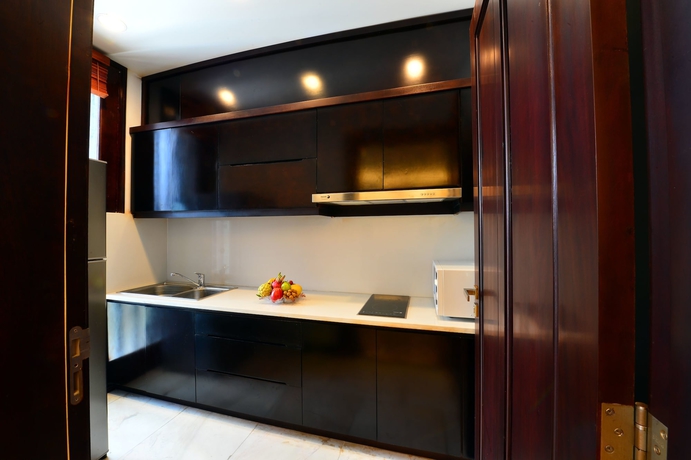 Imagen de la habitación del Hotel Ncc Garden Villas. Foto 7