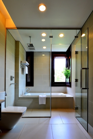 Imagen de la habitación del Hotel Ncc Garden Villas. Foto 8