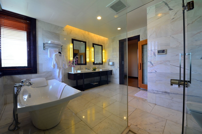 Imagen de la habitación del Hotel Ncc Garden Villas. Foto 11