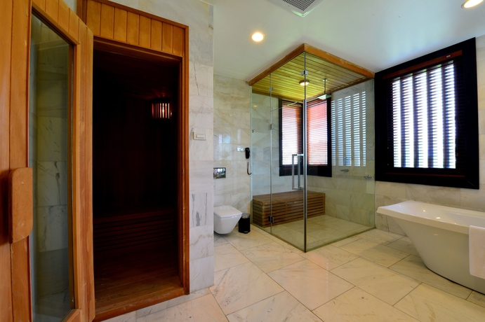 Imagen de la habitación del Hotel Ncc Garden Villas. Foto 12