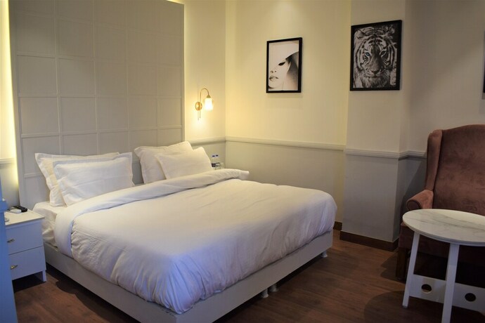 Imagen de la habitación del Hotel Nd Manor. Foto 16