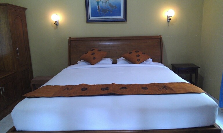 Imagen de la habitación del Hotel Ndalem Bantul. Foto 15