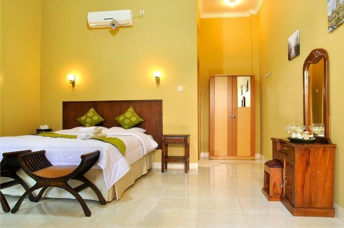 Imagen de la habitación del Hotel Ndalem Bantul. Foto 16