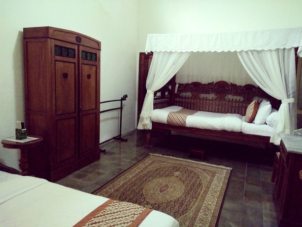 Imagen de la habitación del Hotel Ndalem Natan Royal Heritage. Foto 3