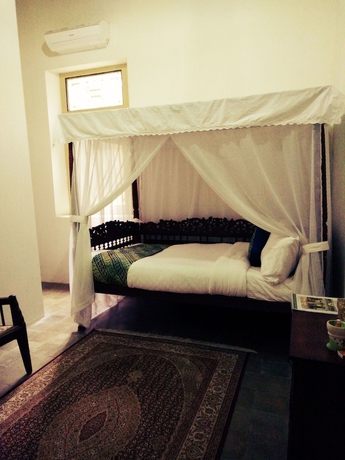 Imagen de la habitación del Hotel Ndalem Natan Royal Heritage. Foto 7