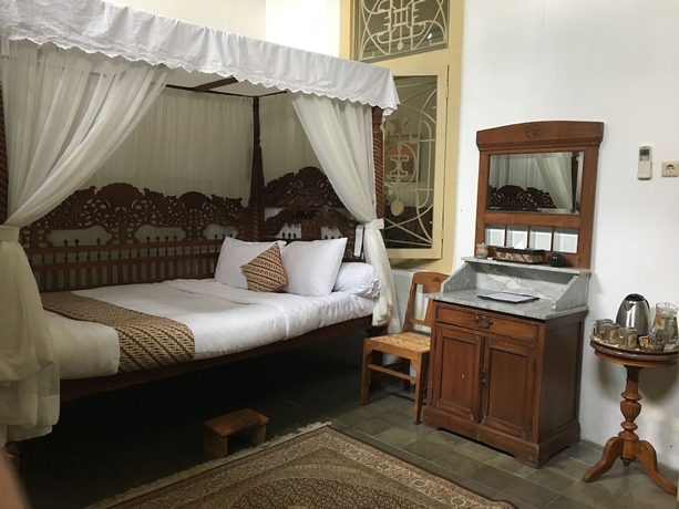 Imagen de la habitación del Hotel Ndalem Natan Royal Heritage. Foto 10