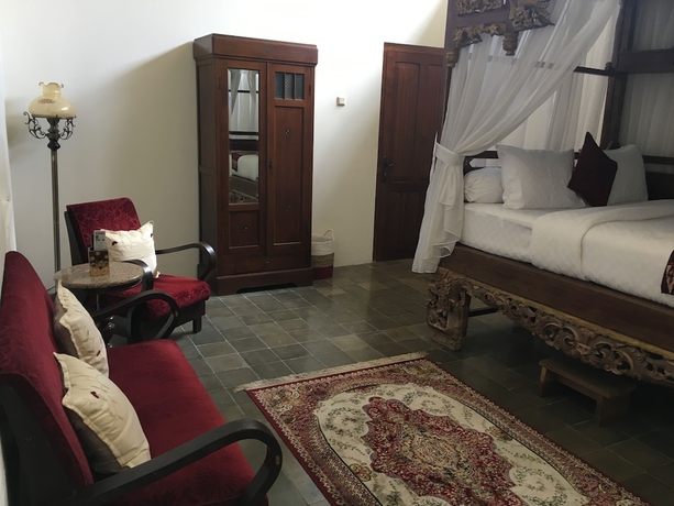 Imagen de la habitación del Hotel Ndalem Natan Royal Heritage. Foto 11