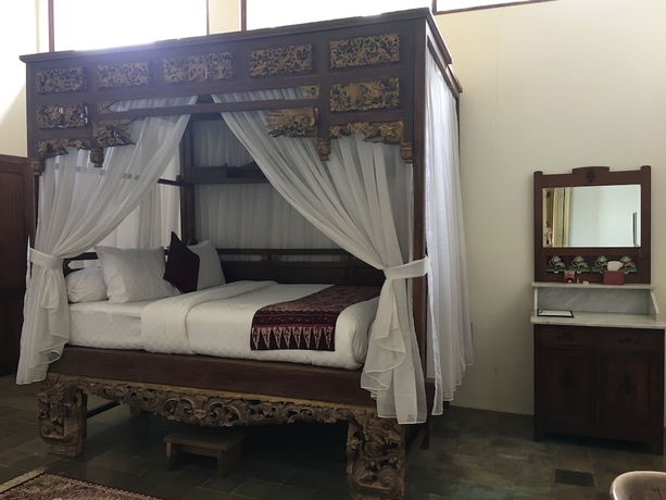 Imagen de la habitación del Hotel Ndalem Natan Royal Heritage. Foto 12