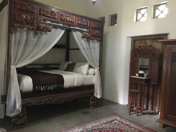 Imagen de la habitación del Hotel Ndalem Natan Royal Heritage. Foto 14