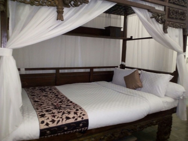 Imagen de la habitación del Hotel Ndalem Natan Royal Heritage. Foto 16