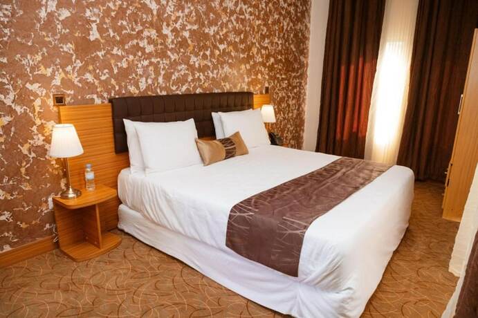 Imagen de la habitación del Hotel Ndaru Luxury Suites. Foto 15