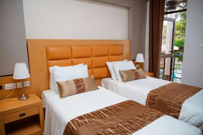 Imagen de la habitación del Hotel Ndaru Luxury Suites. Foto 19