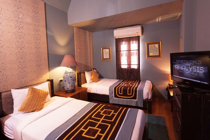 Imagen de la habitación del Hotel Ndol Streamside Thai Villas. Foto 4