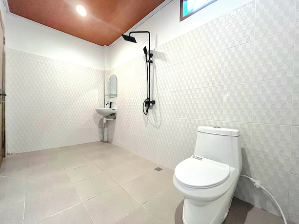 Imagen de la habitación del Hotel NeNa Eat and Sleep Kuta. Foto 7