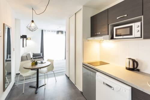 Imagen de la habitación del Hotel Néméa Apparthotel Stadium. Foto 7