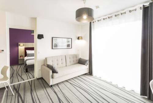 Imagen de la habitación del Hotel Néméa Apparthotel Stadium. Foto 8