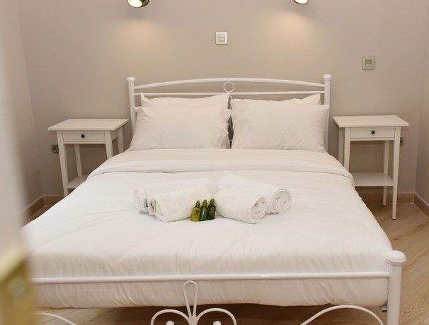 Imagen de la habitación del Hotel Neapolis 1897 Boutique Luxury Rooms. Foto 4