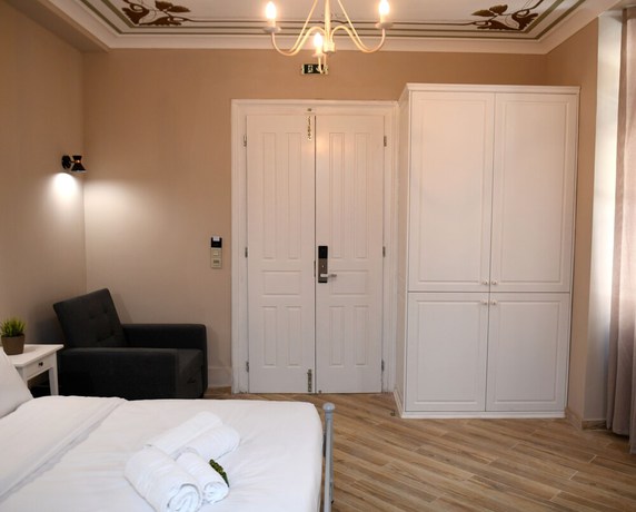 Imagen de la habitación del Hotel Neapolis 1897 Boutique Luxury Rooms. Foto 8