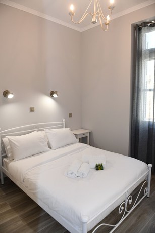 Imagen de la habitación del Hotel Neapolis 1897 Boutique Luxury Rooms. Foto 15