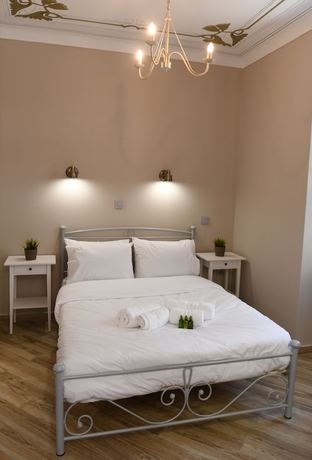 Imagen de la habitación del Hotel Neapolis 1897 Boutique Luxury Rooms. Foto 16