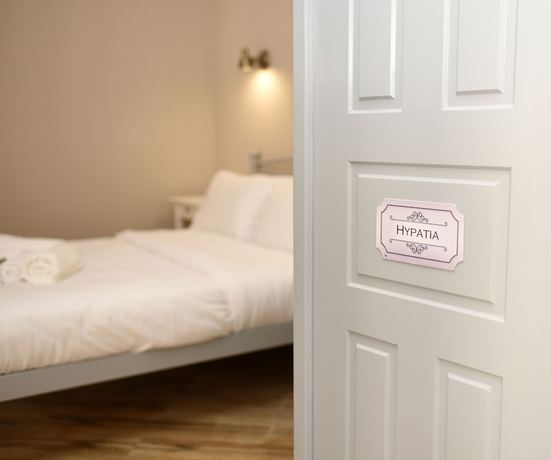 Imagen de la habitación del Hotel Neapolis 1897 Boutique Luxury Rooms. Foto 18