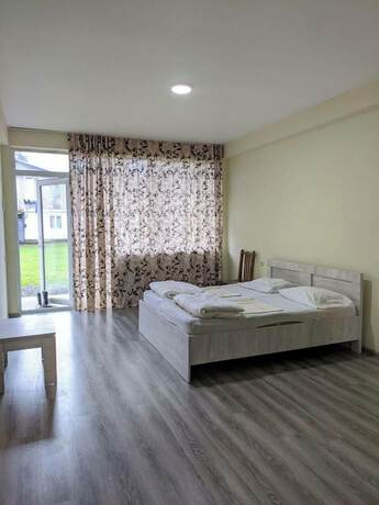 Imagen de la habitación del Hotel Near The Beach. Foto 7