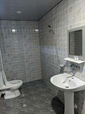 Imagen de la habitación del Hotel Near The Beach. Foto 8