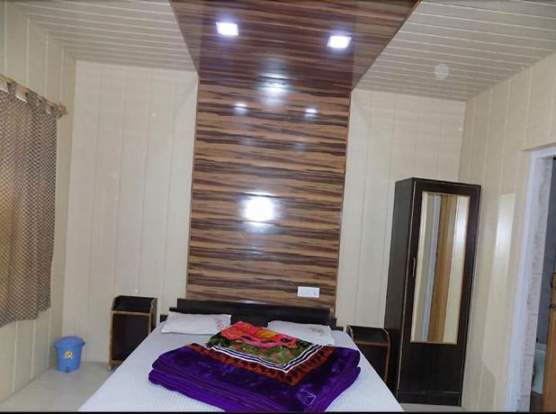 Imagen de la habitación del Hotel Neelam Raj. Foto 13