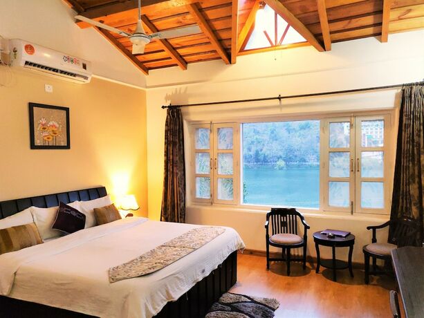 Imagen de la habitación del Hotel Neelesh Inn - A Luxury Lake View. Foto 18