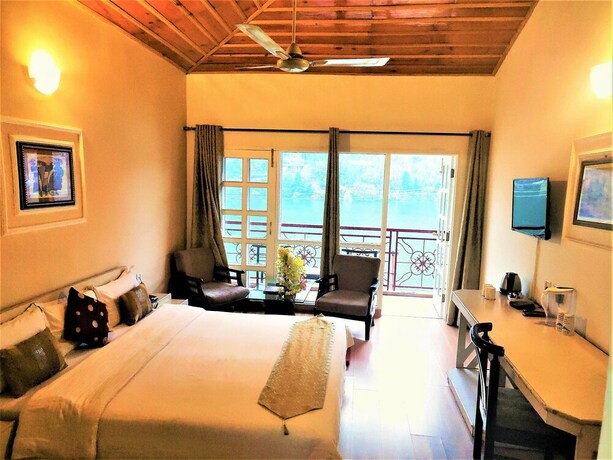 Imagen de la habitación del Hotel Neelesh Inn - A Luxury Lake View. Foto 23