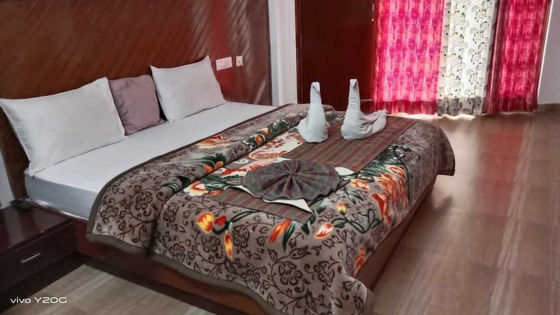 Imagen de la habitación del Hotel Neelgiri. Foto 6