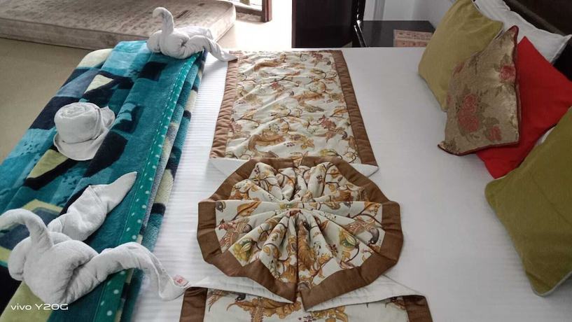Imagen de la habitación del Hotel Neelgiri. Foto 8