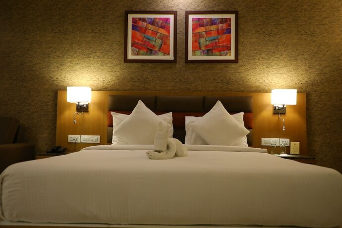 Imagen de la habitación del Hotel Neel's City Resort. Foto 14