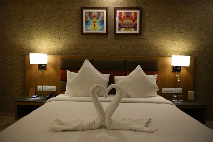 Imagen de la habitación del Hotel Neel's City Resort. Foto 16