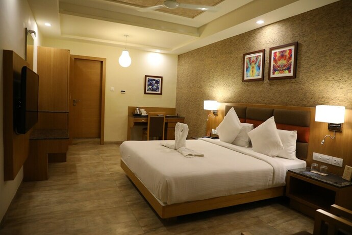 Imagen de la habitación del Hotel Neel's City Resort. Foto 18