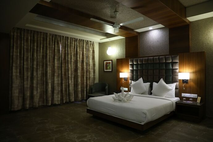 Imagen de la habitación del Hotel Neel's City Resort. Foto 19