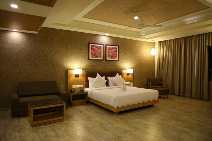 Imagen de la habitación del Hotel Neel's City Resort. Foto 20