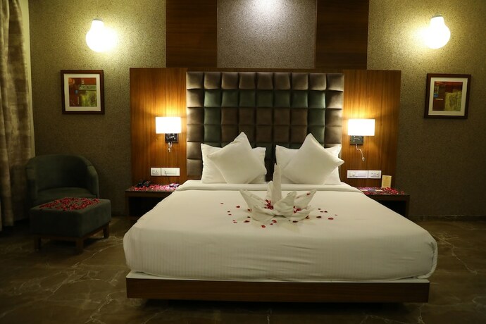 Imagen de la habitación del Hotel Neel's City Resort. Foto 24