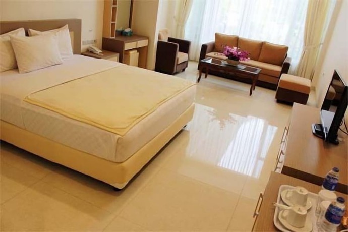 Imagen de la habitación del Hotel Negeri Baru And Resort Kalianda. Foto 3