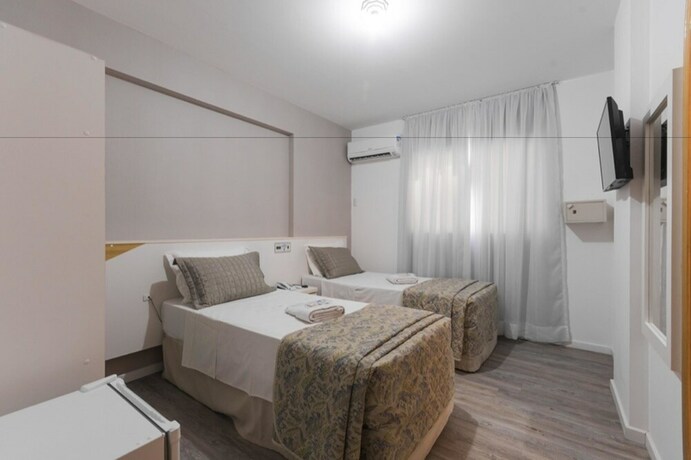 Imagen de la habitación del Hotel Negrini. Foto 23