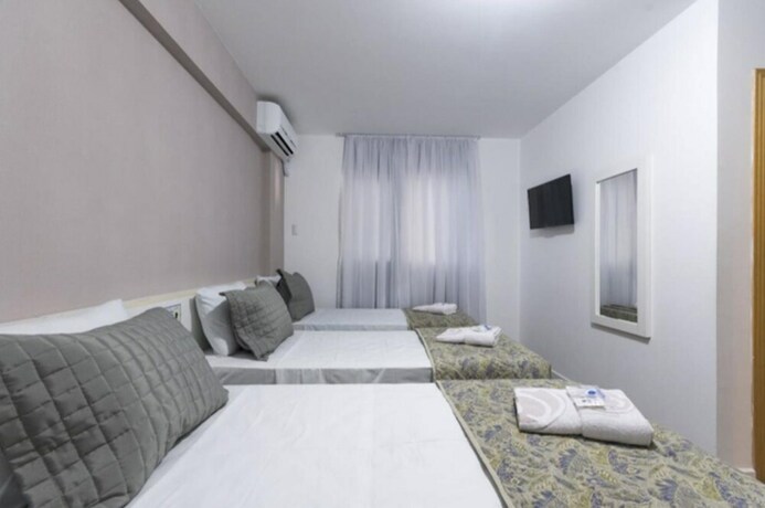 Imagen de la habitación del Hotel Negrini. Foto 28