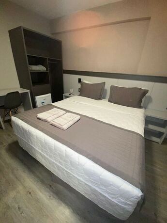 Imagen de la habitación del Hotel Negrini. Foto 31