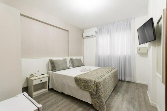 Imagen de la habitación del Hotel Negrini. Foto 33