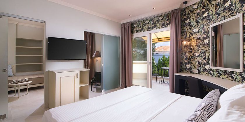 Imagen de la habitación del Hotel Neikos Luxury Suites. Foto 5