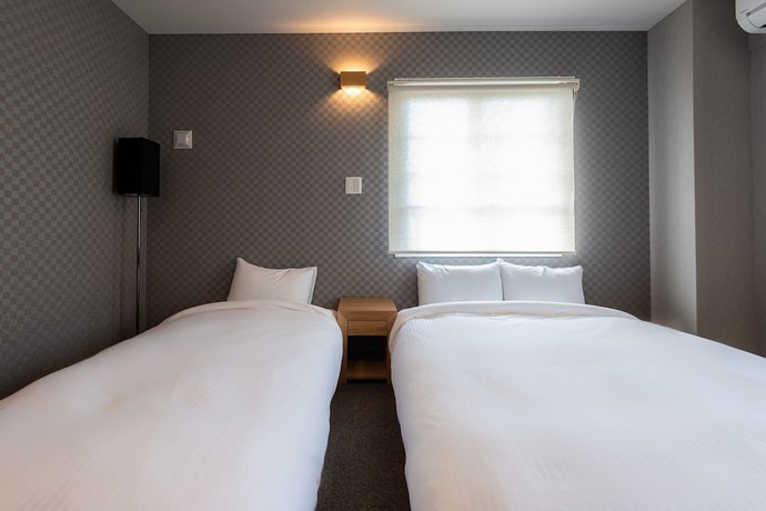 Imagen de la habitación del Hotel Neiraku. Foto 7