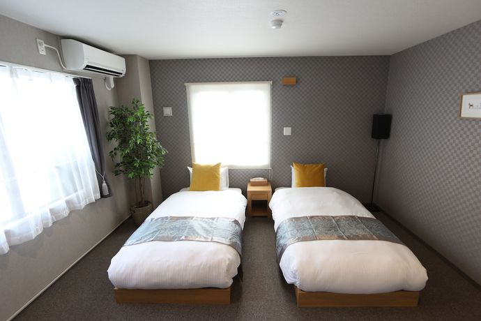 Imagen de la habitación del Hotel Neiraku. Foto 8